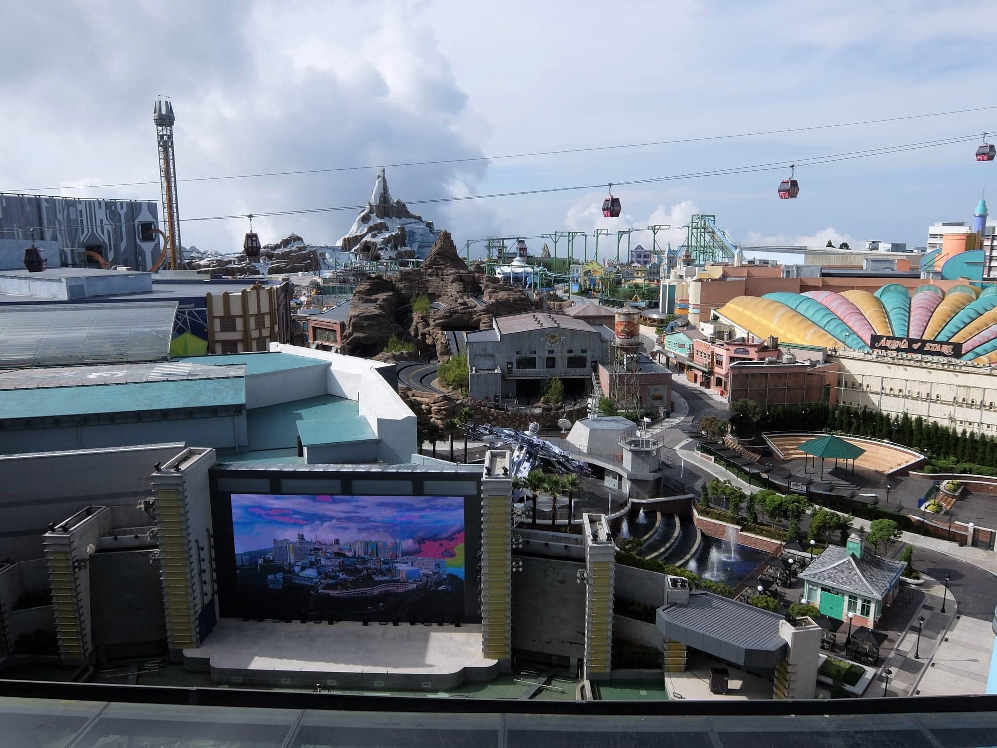 Genting SkyWorlds theme park from above, cable cars crossing the sky over the rides